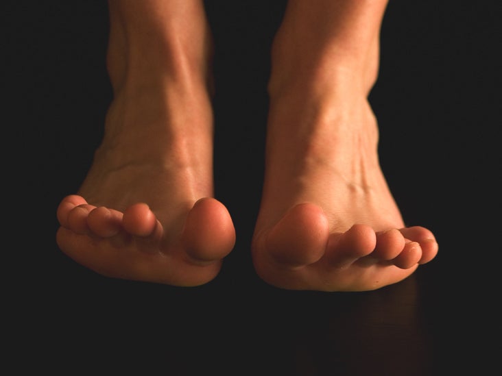 sore soles of feet at night