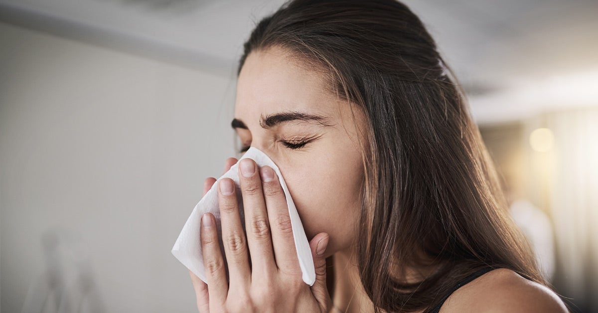Is Holding in a Sneeze Dangerous? Potential Side Effects