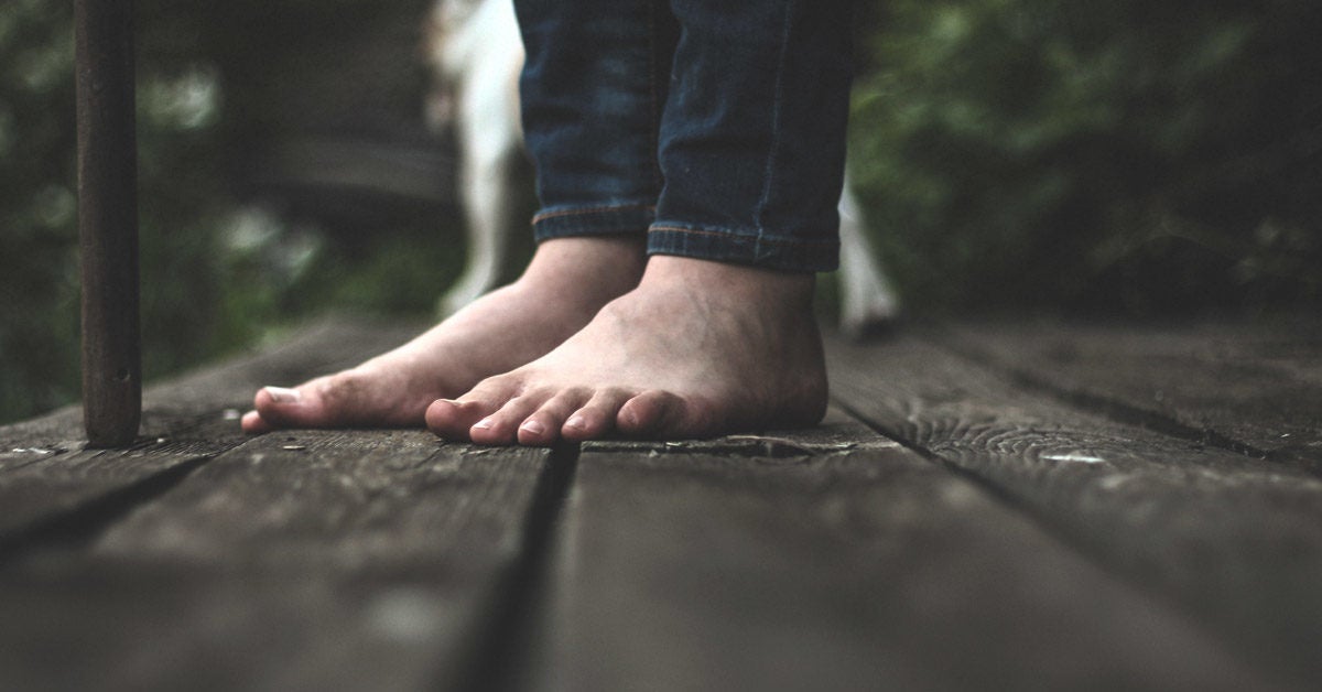 running barefoot on road
