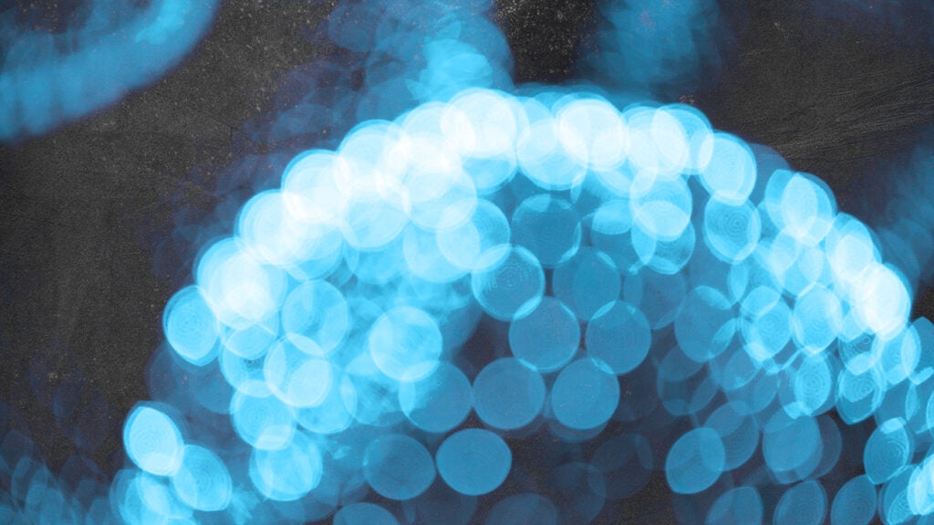 a close up of blue light specks