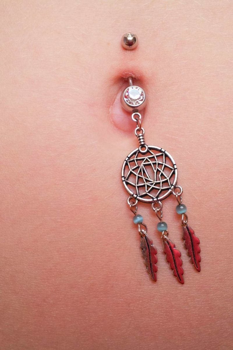 Signs your belly button piercing is healed.