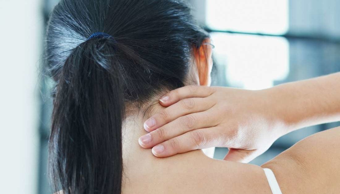 What can cause a lump on the back of the neck hairline?