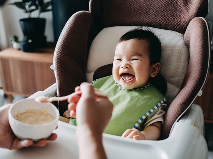 5 month old eating baby food