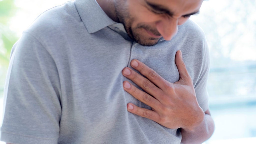 Chest pain when breathing When to call 911, causes, and treatment