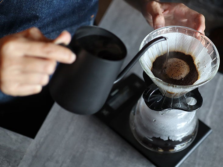 Does coffee raise blood pressure, and should I drink it regularly?