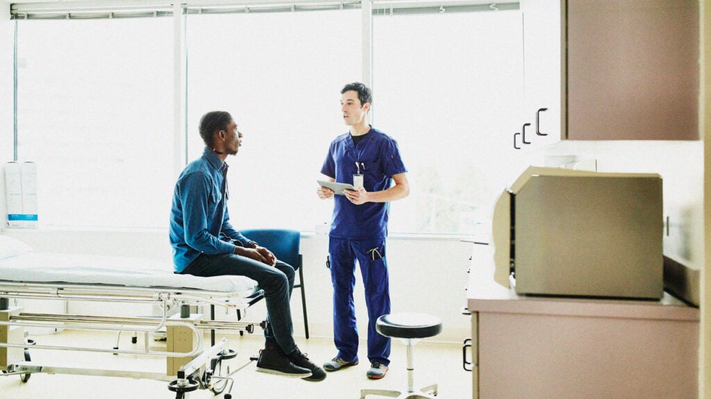 male-patient-doctor-talk