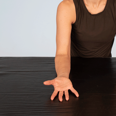 A person stretching their thumb, gif