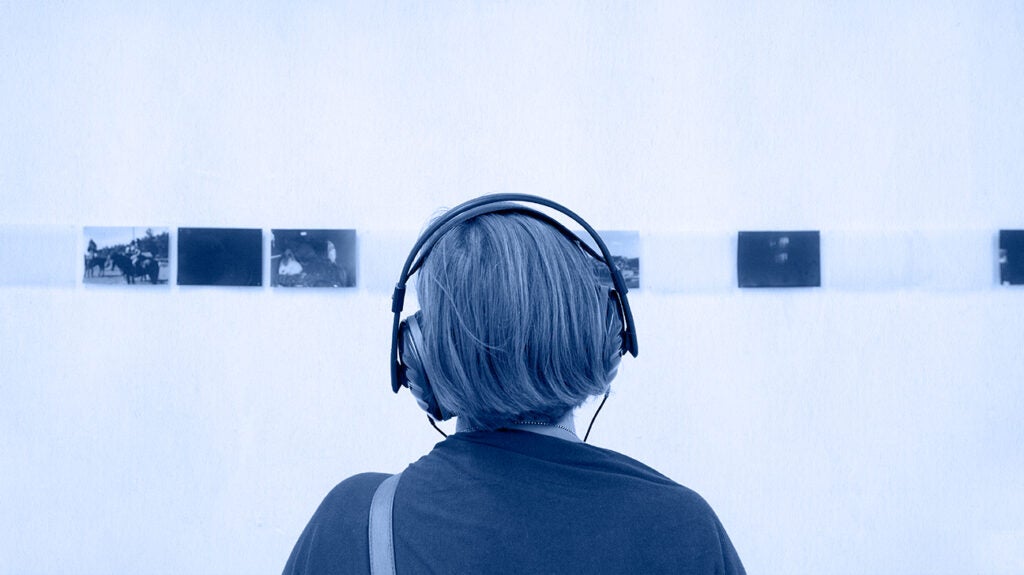 A person listening through headphones.