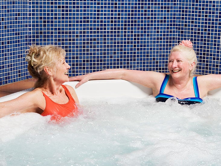 Soaking in a hot tub has the 'same health benefits' as going for a  30-minute jog, scientists reveal