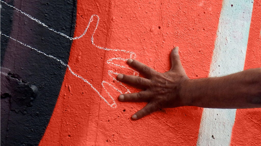 A chalk outline of a hand.